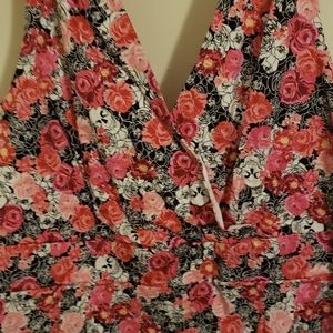 TORRID Surplice/peplum skull / floral blouse